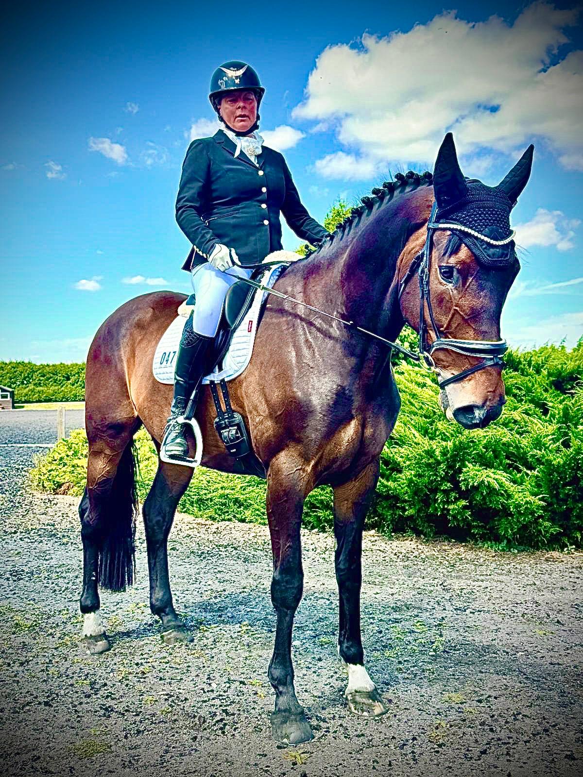 Rachael with her horse after successful Harry Hall horse insurance claim, highlighting care and protection for horse riders.